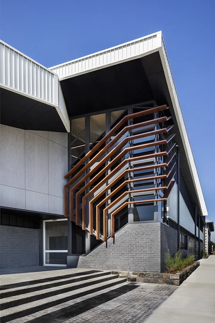 Entrance stairway and balcony access to spectator facilities overlooking the sports grounds.